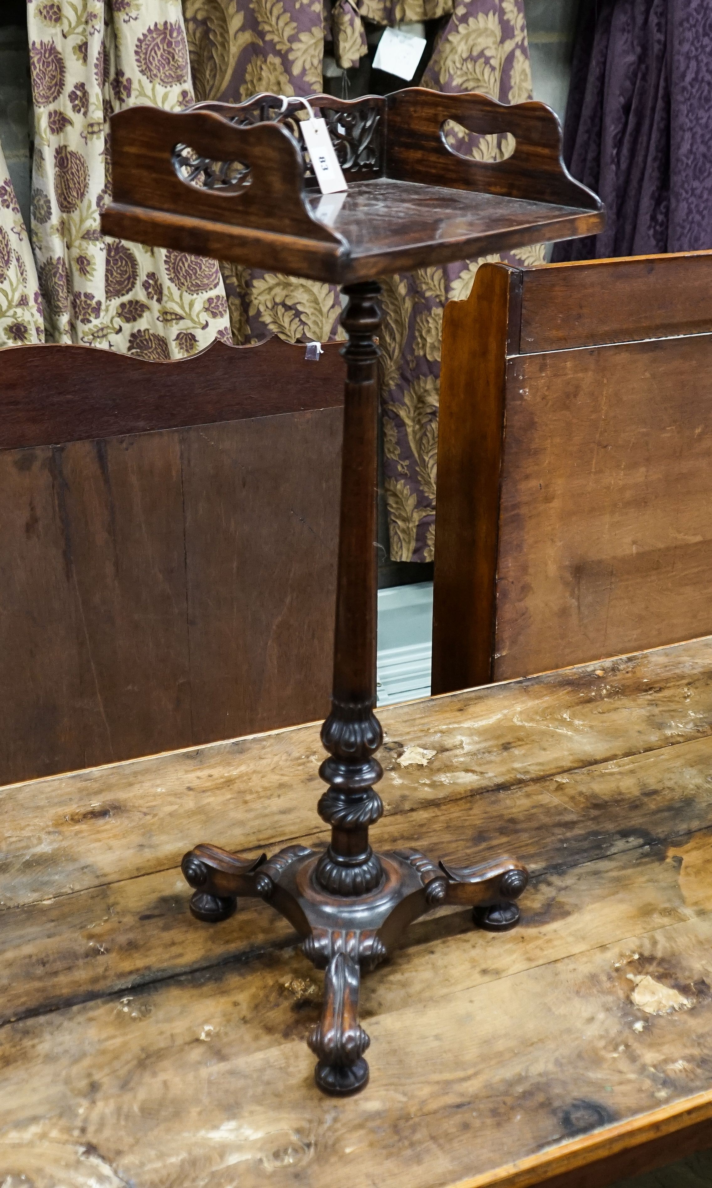 A William IV and later rosewood tray top bookstand, width 38cm, depth 27cm, height 90cm
